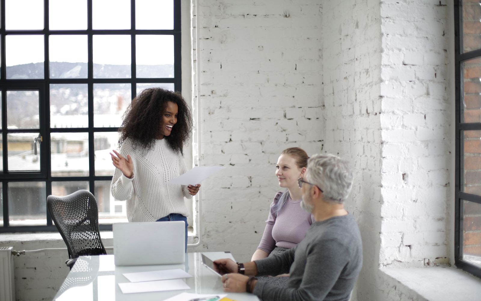 Team planning in an office; illustrative people